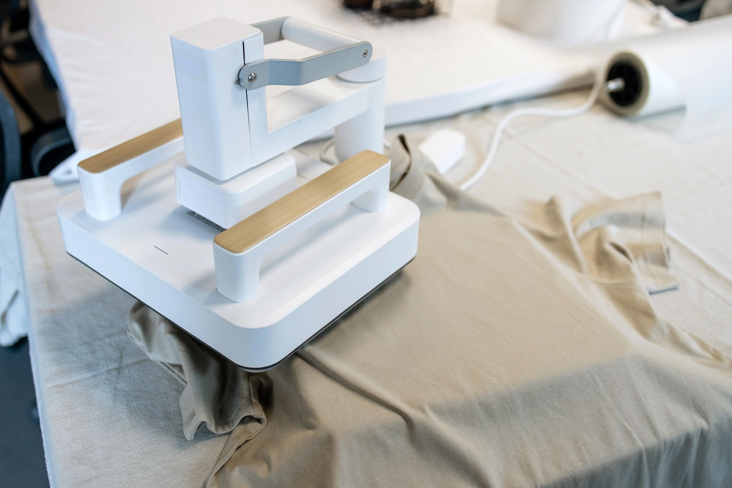 Close-up of a heat press printing a custom t-shirt